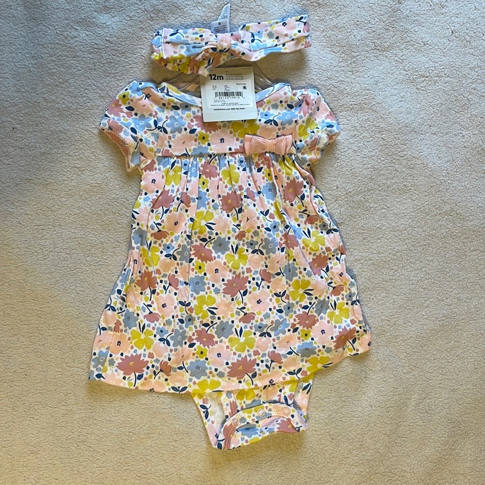 NWT. Carter’s onesie with headband
